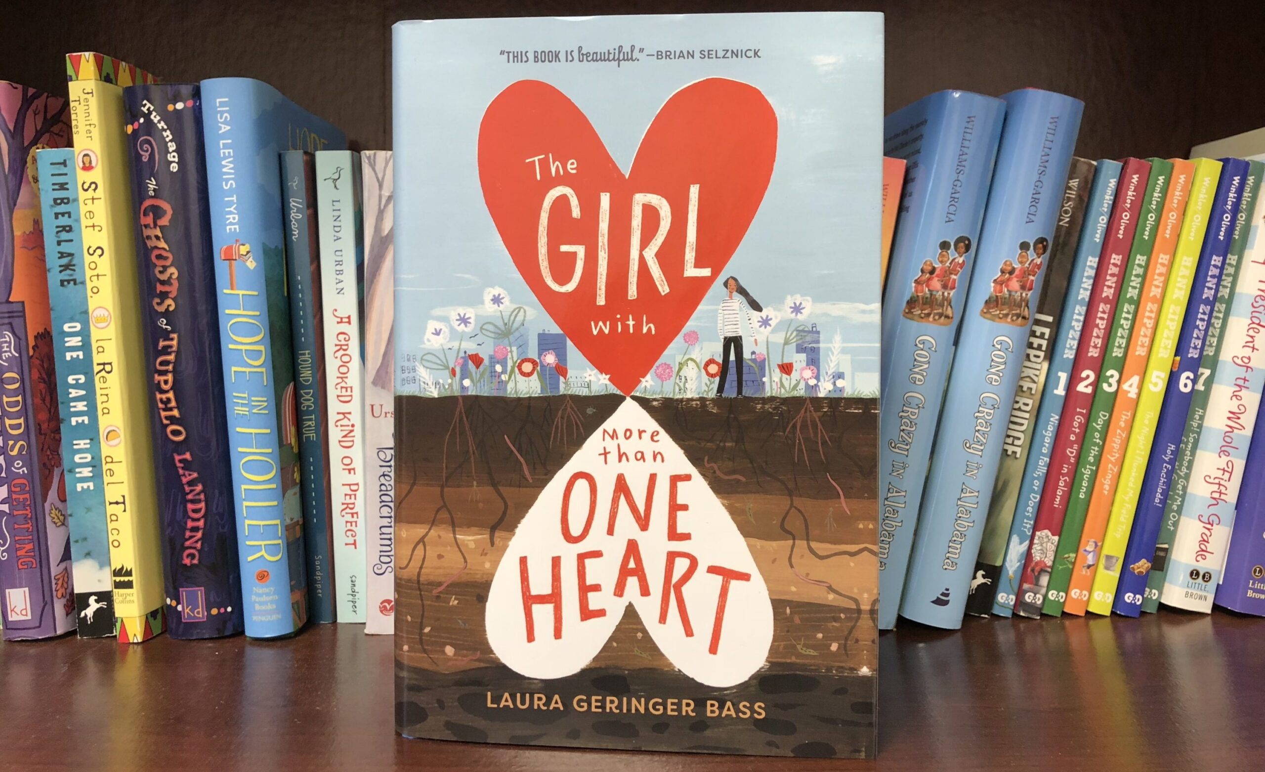 Laura Geringer Bass, The Girl With More Than One Heart (Abrams)