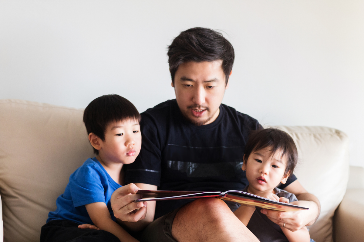 asian father reading with his two sons, family engagement resources