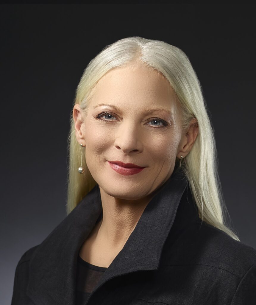 professional headshot image of Sharon Price John, the President and CEO of Build-A-Bear Workshop.
